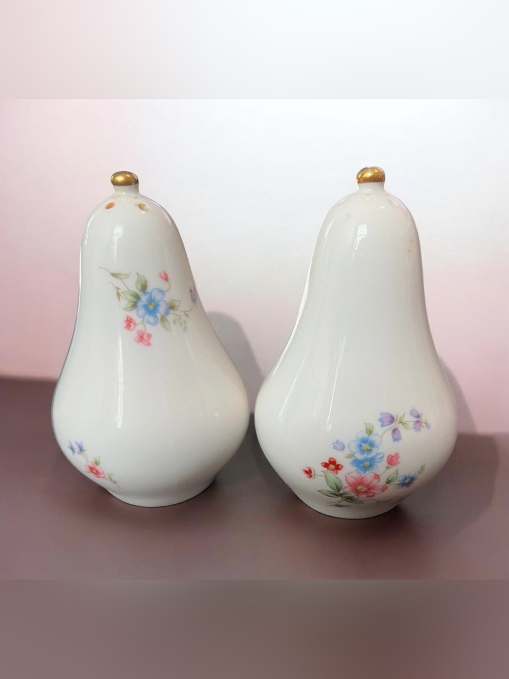 white porcelain pear-shaped salt and pepper shakers, delicate floral motif